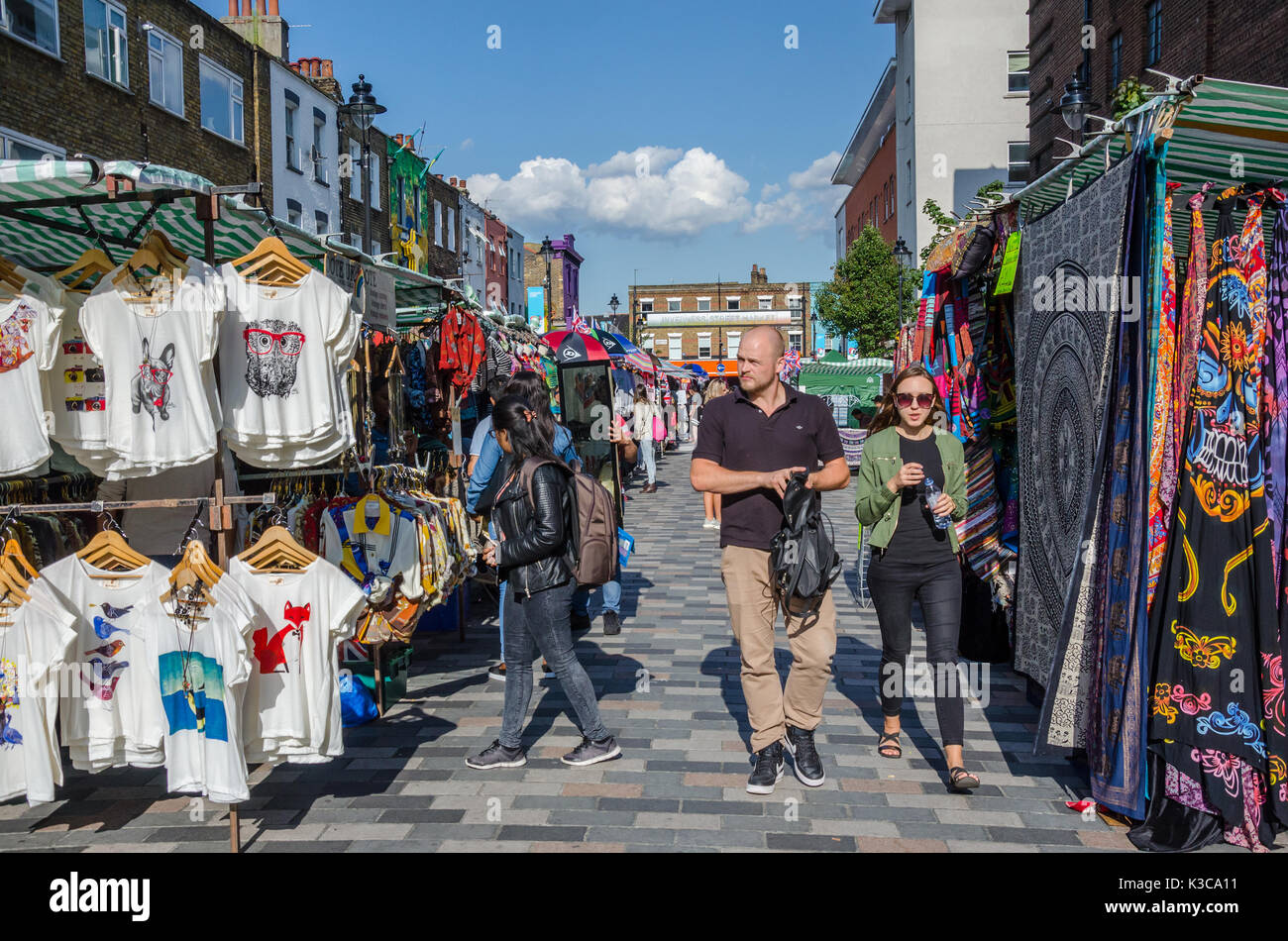 People wander through Inverness Street Market in Camden Town, London. Stock Photo