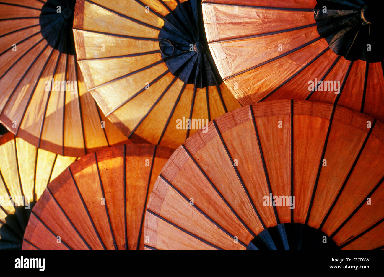 Rice-paper umbrellas displayed at the evening market, Luang Prabang, Laos Stock Photo