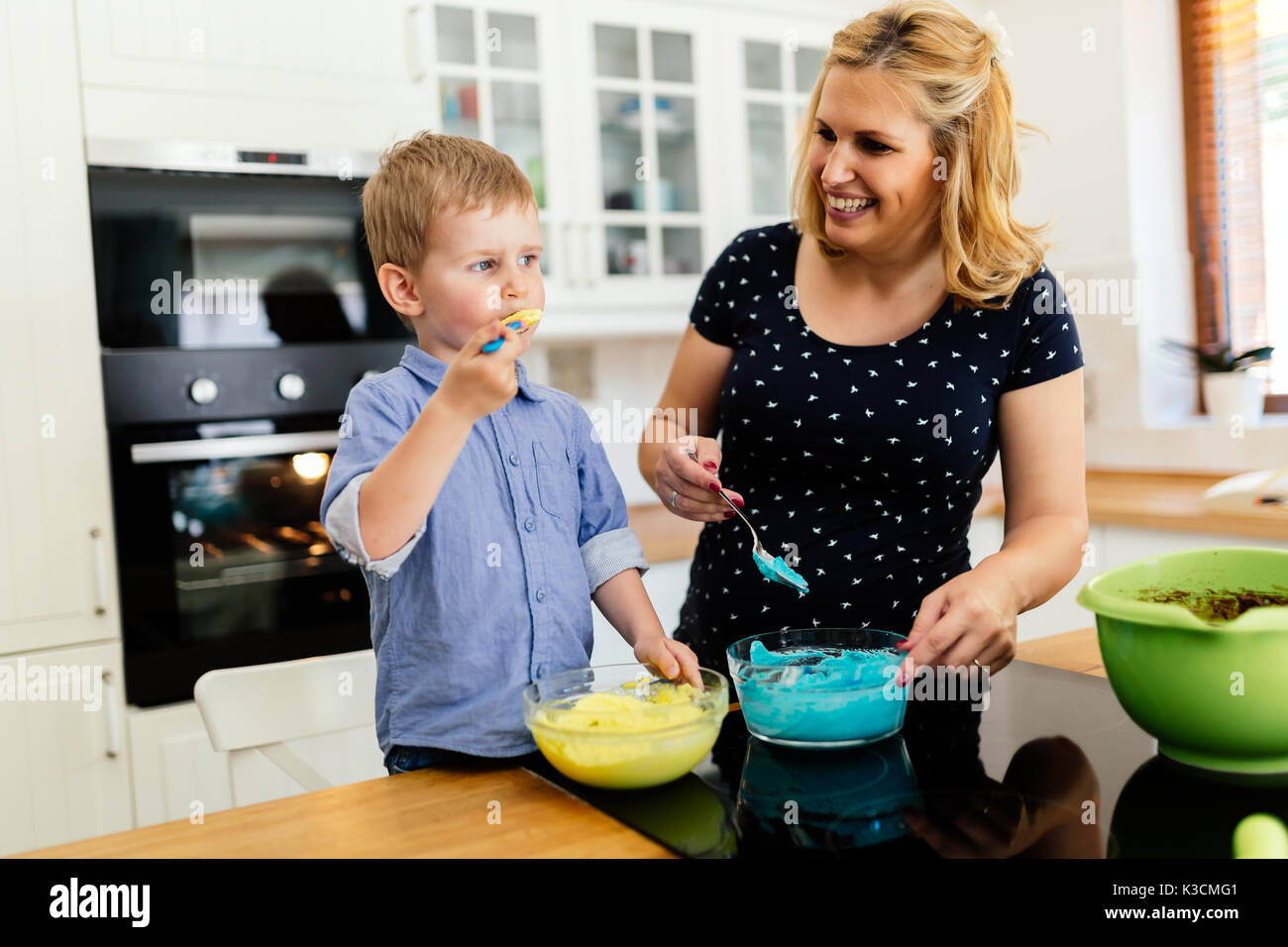 cute-child-tasting-cookie-ingredients-stock-photo-alamy