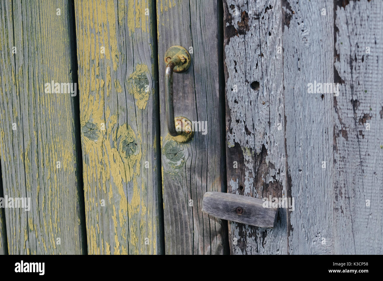 Old wooden door with swinging lock Stock Photo Alamy
