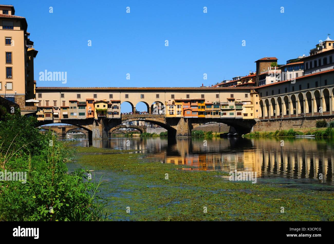 The Famous Old Bridge (Ponte Vecchio) With Blue Sky In Florence, Italy ...