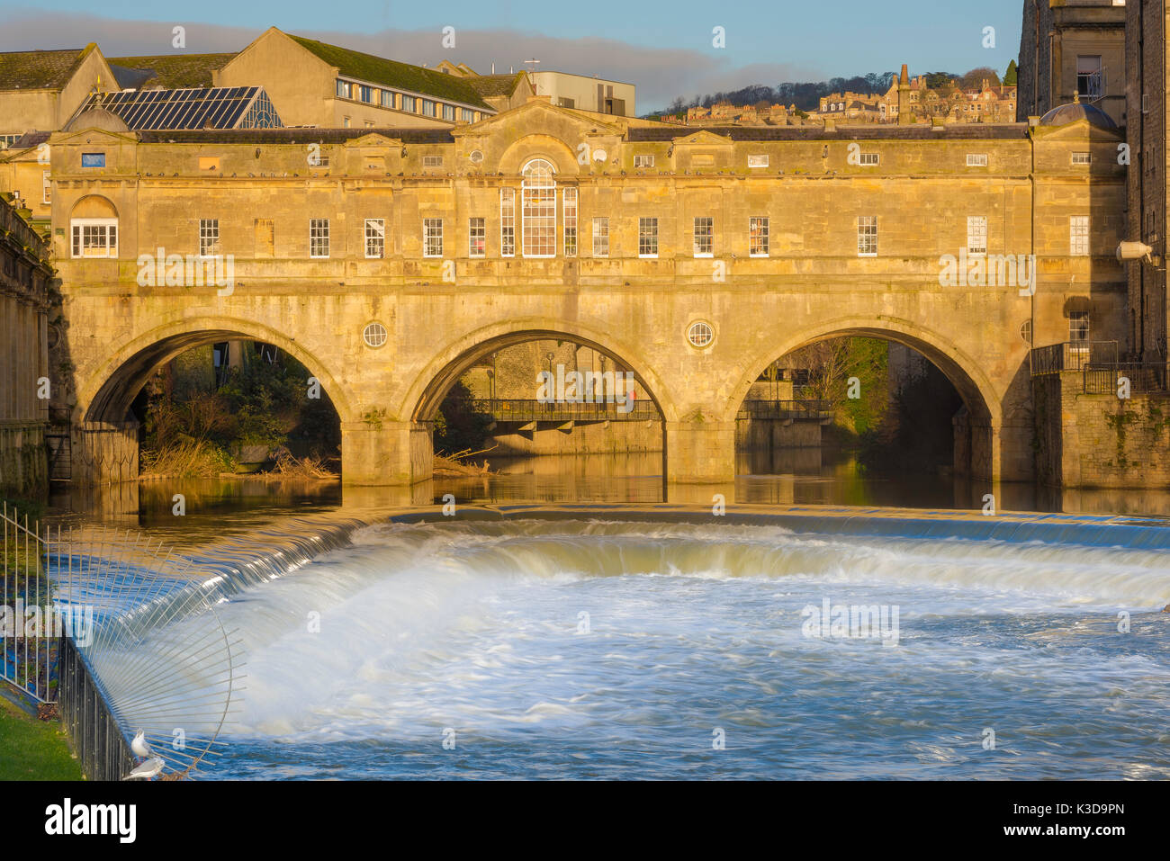 Bath bridge UK, view of the the Robert Adam designed Pulteney Bridge in Bath with the city weir on the River Avon in the foreground, UK Stock Photo