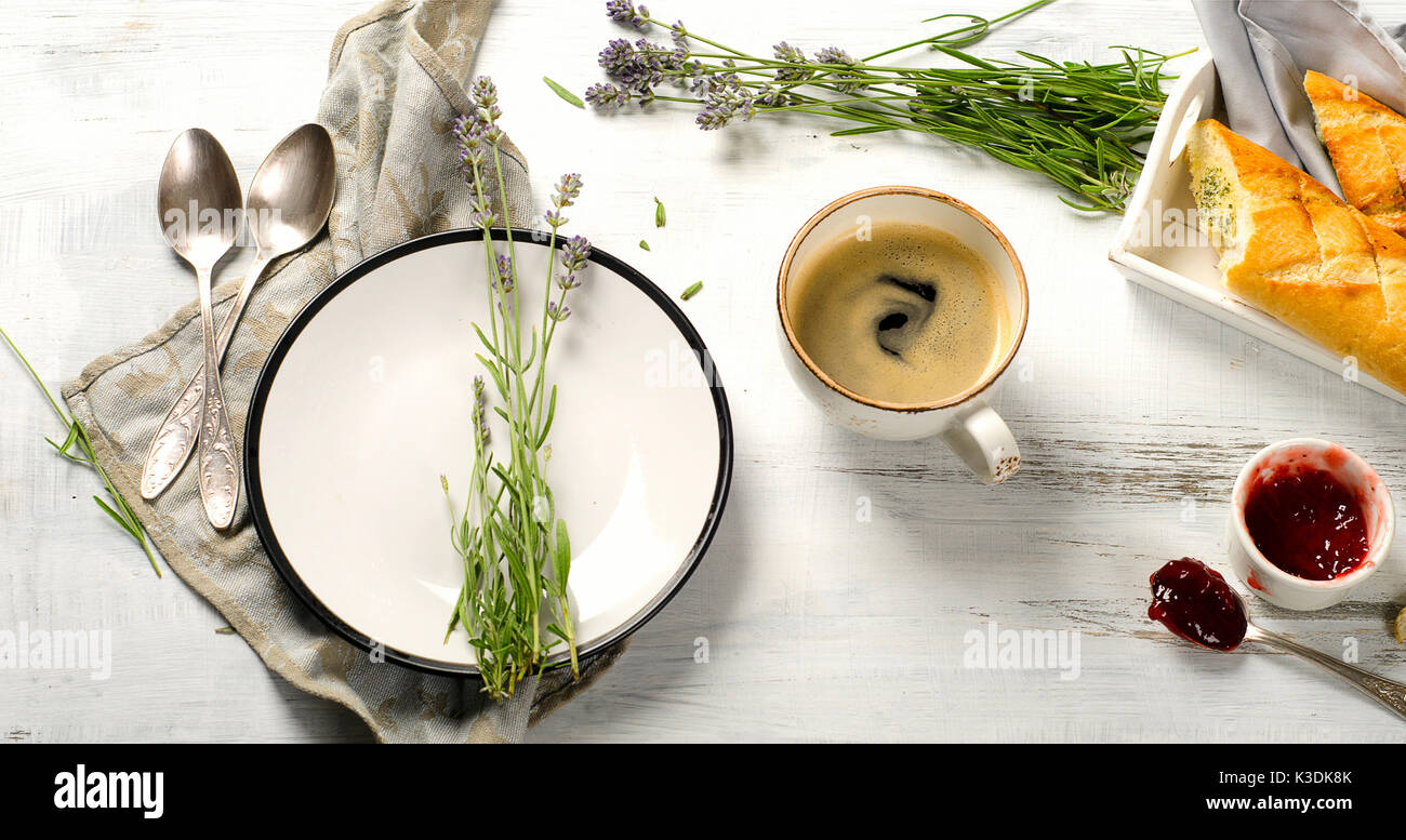 Breakfast with coffee  on white wooden table.  Kinfolk Still Life Stock Photo