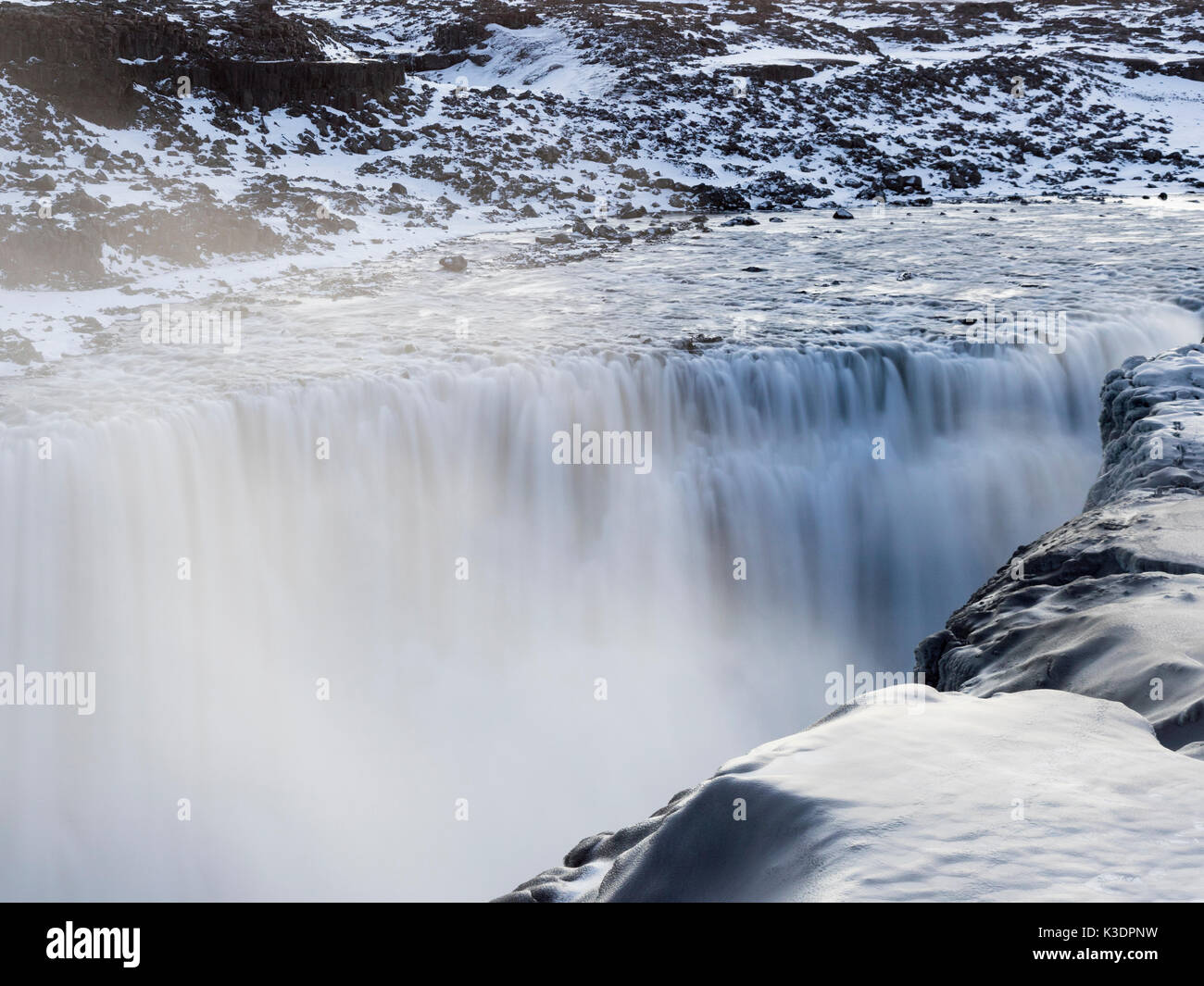 The Impressive Aldeyjarfoss Waterfall Surrounded By Ice Stock Photo
