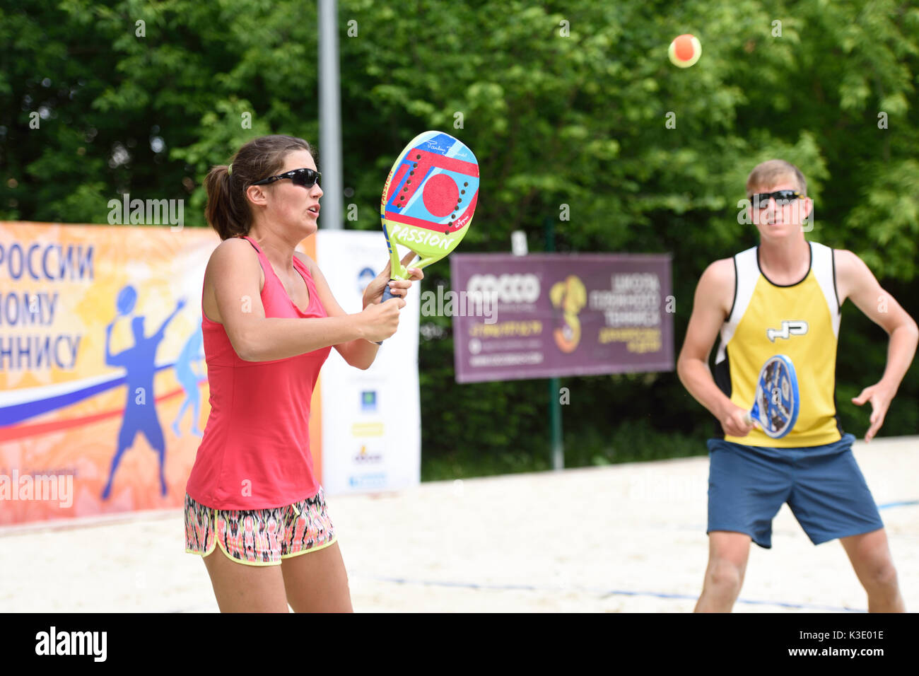 Moscow, Russia - May 31, 2015: Yulia Chubarova and Nikolay Guriev in the match of Russian beach tennis championship. 120 adults and 28 young athletes  Stock Photo