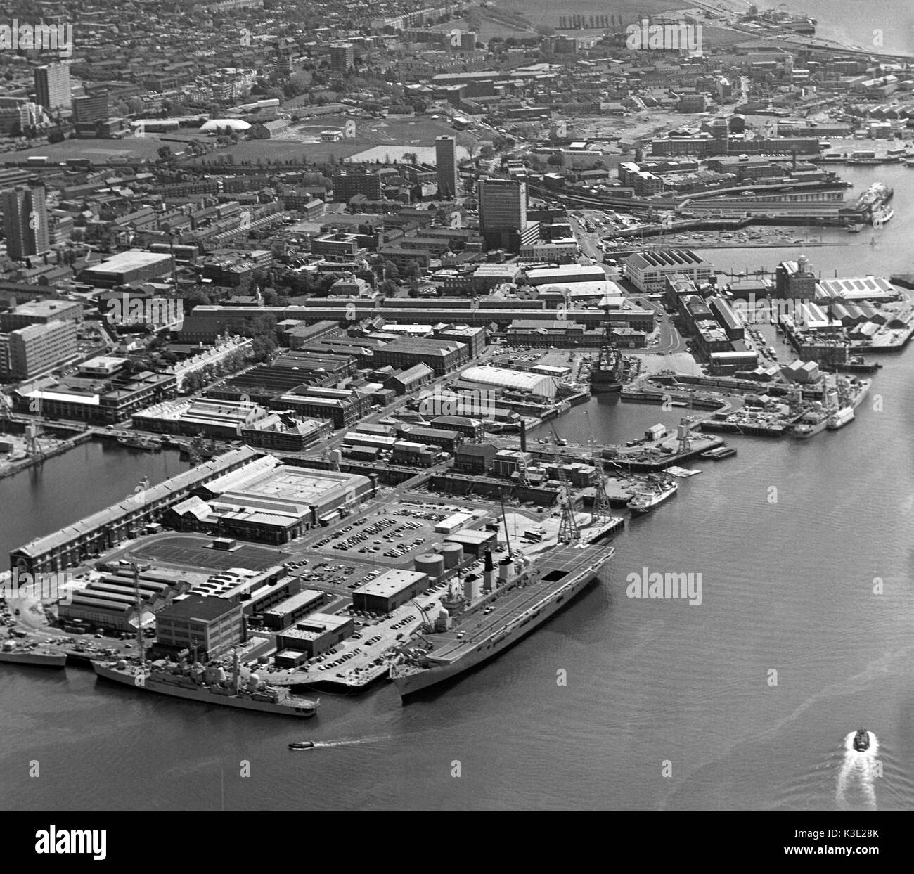 Aerial view of Portsmouth Harbour and Naval Dockyard with the City of Portsmouth in the background, Portsmouth, Hampshire, England, UK - 13th May 1985 Stock Photo