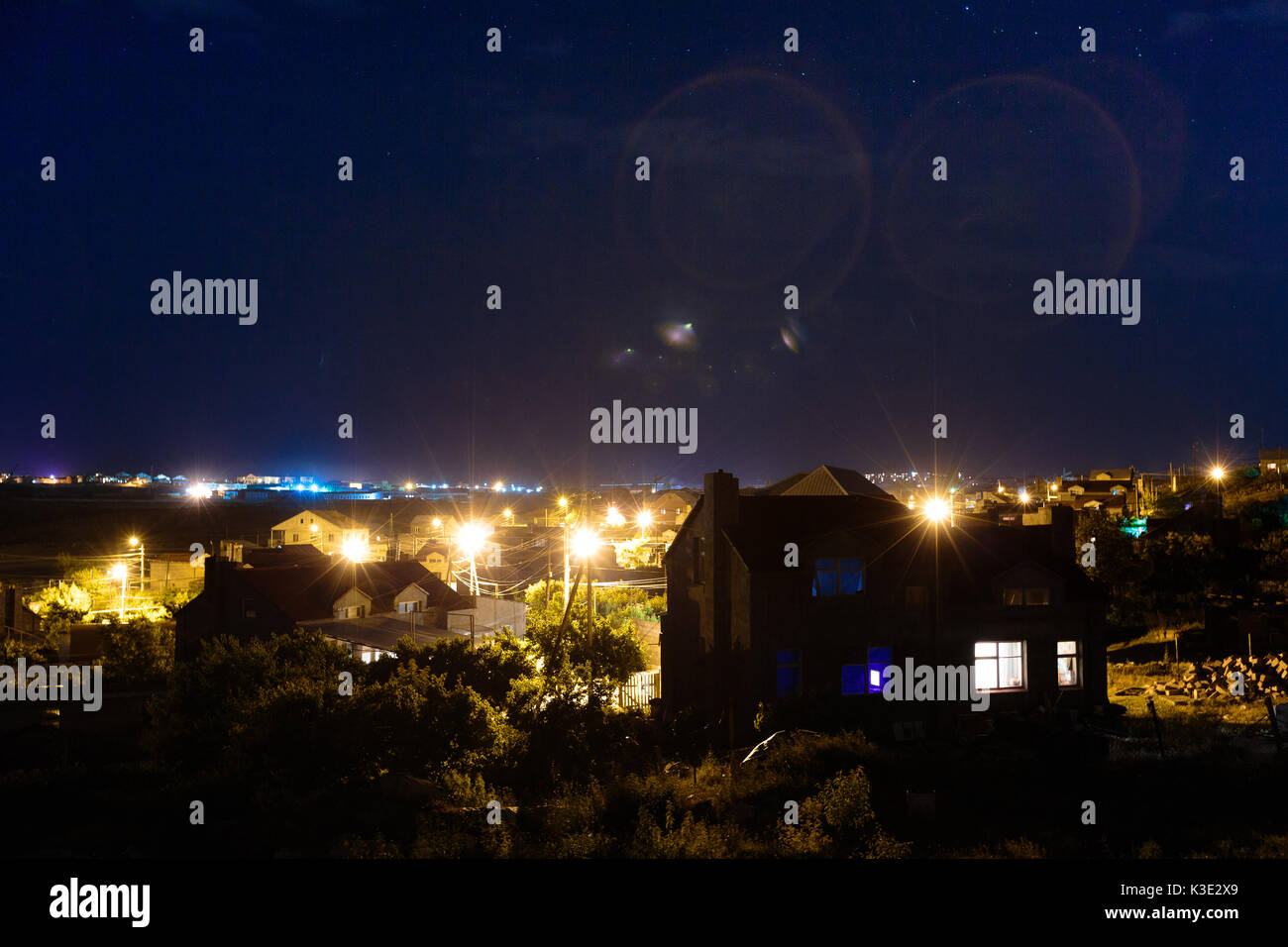Movement of stars over the houses of Yerevan, Armenia Stock Photo