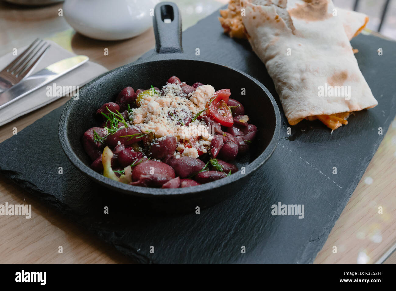 Fried beans in a frying pan Stock Photo