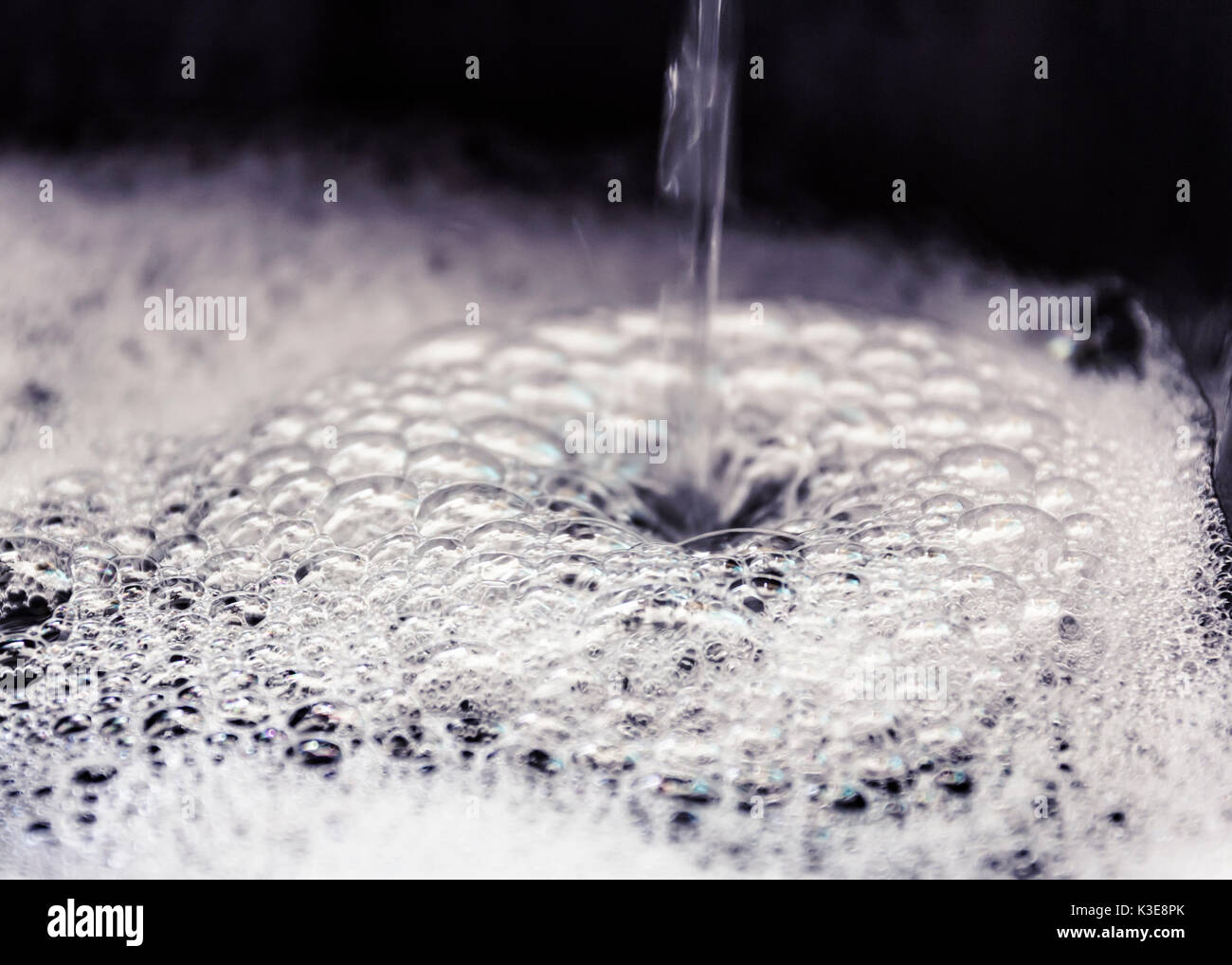 Running Tap Water creating Bubbles Stock Photo Alamy