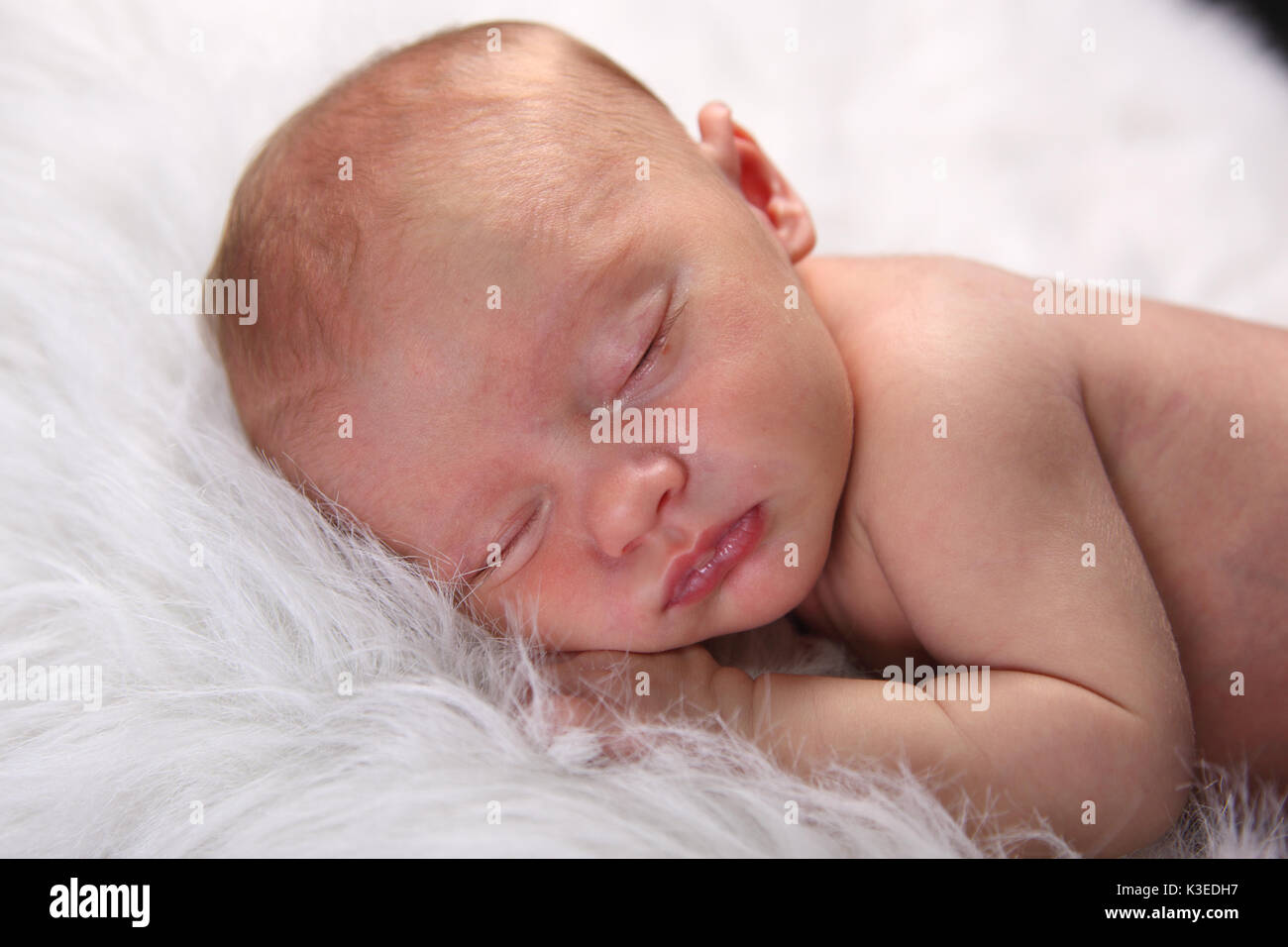 Child curled up blanket hires stock photography and images Alamy