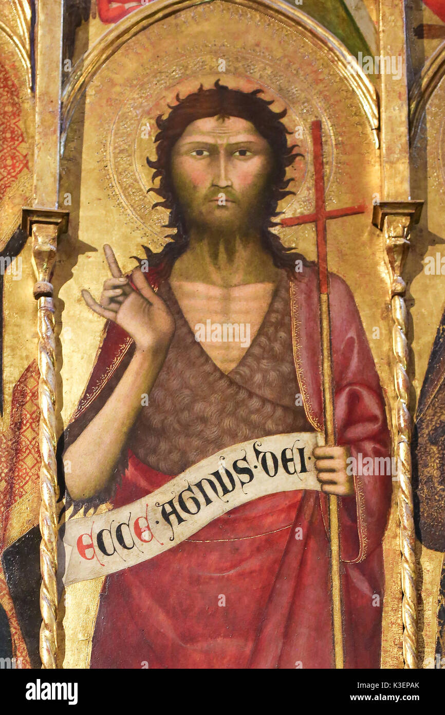 14th Century Polyptich by Andrea Vanni in the Baptistery of San Giovanni in Siena, depicting Saint John the Baptist (with the Latin text ECCE AGNUS DE Stock Photo