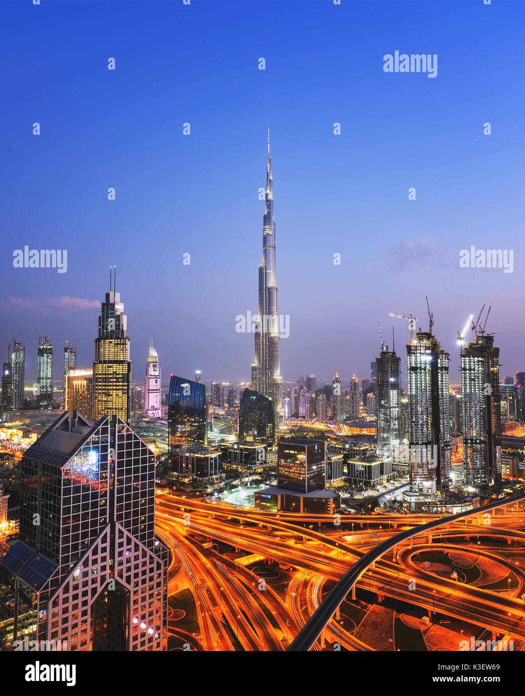 The Burj Khalifa tower at night. This skyscraper is the tallest man-made structure in the world, measuring 828 m. Completed in 2009. Stock Photo