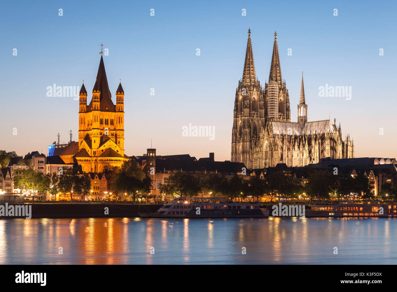 Cologne Cathedral and Church Groß St. Martin at the Rhine River