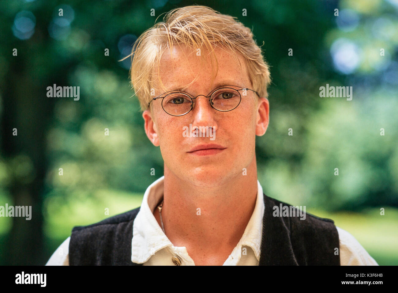 Portrait of Young man with glasses Stock Photo - Alamy