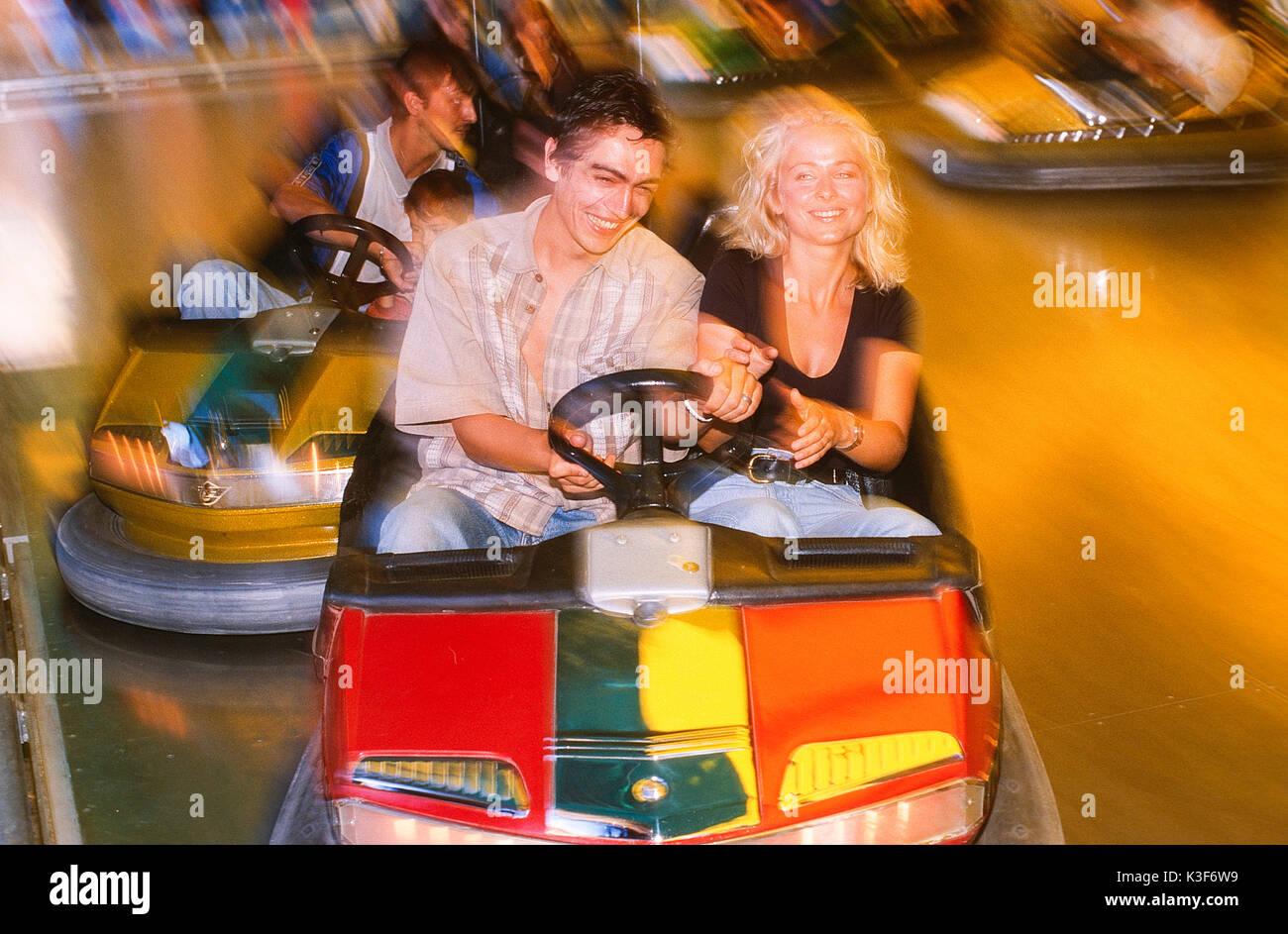 Couple in the bumper car Stock Photo