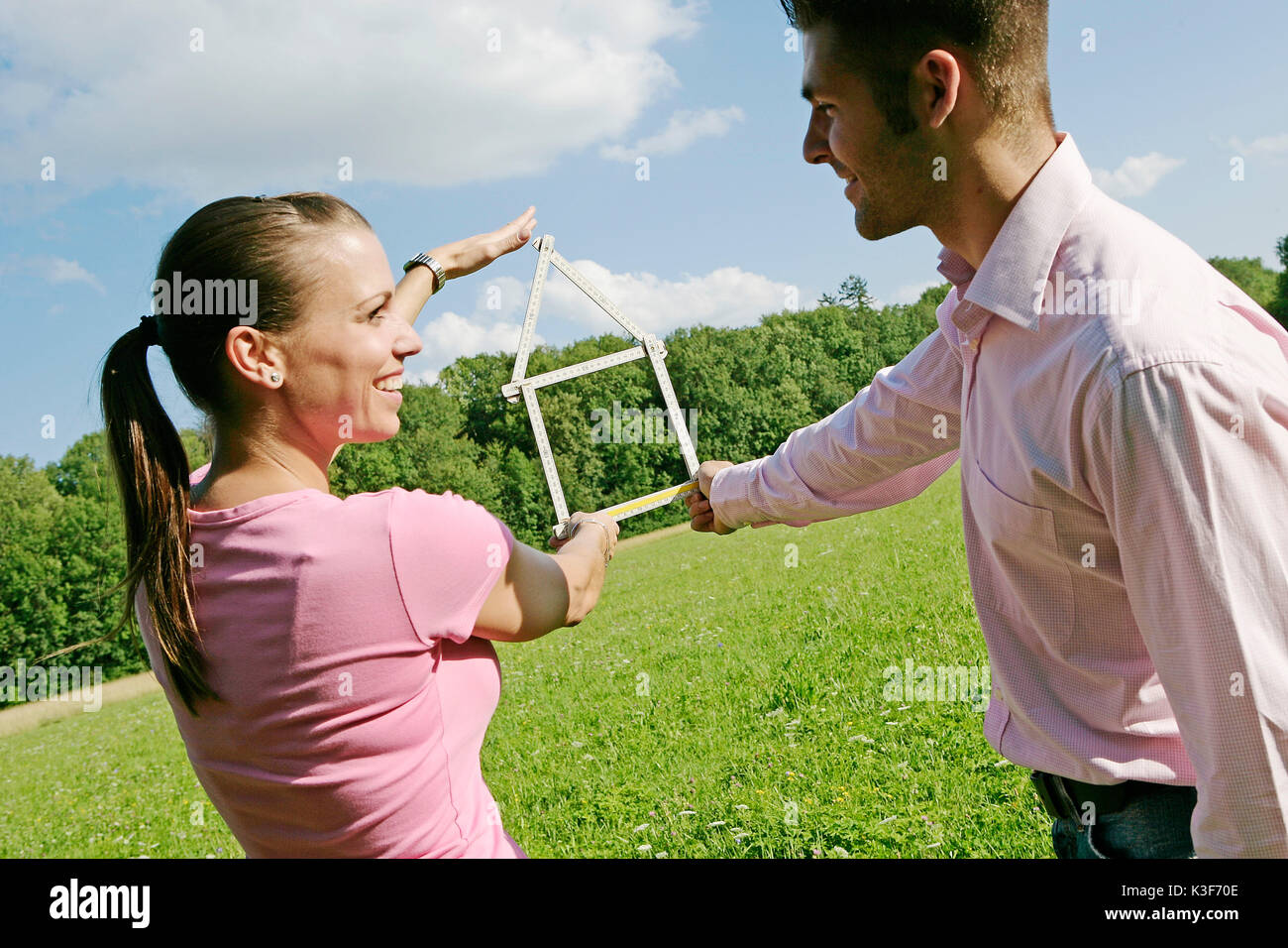 Young couple in love forms hi-res stock photography and images - Alamy