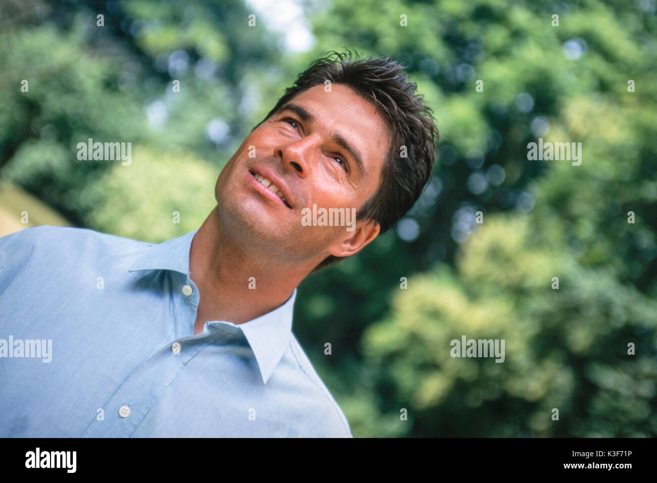 Man looks upwards Stock Photo