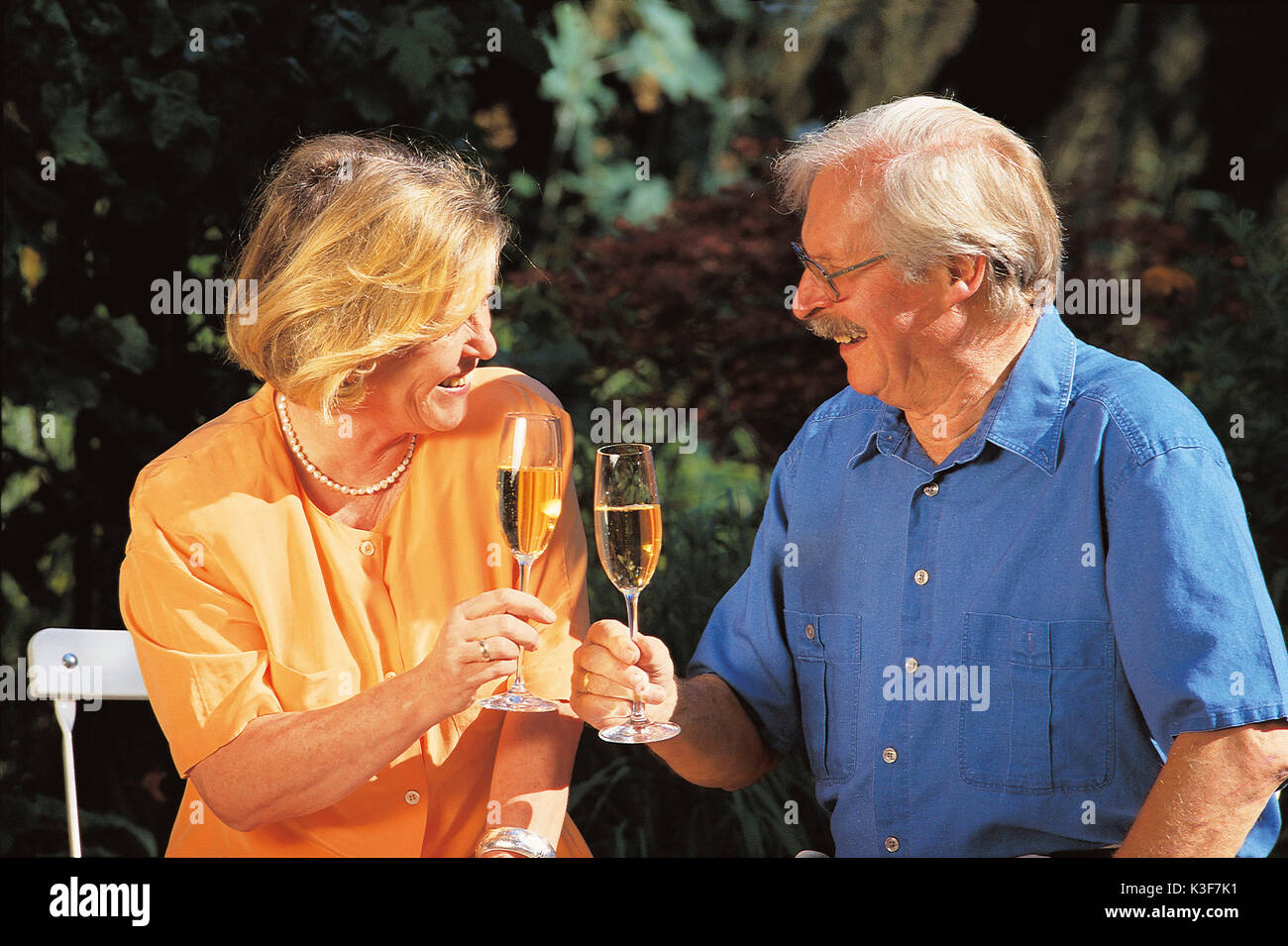 Older couple procontinually to themselves to Stock Photo