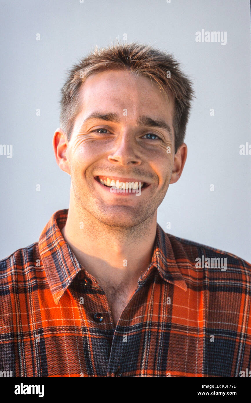 Portrait young laughing man Stock Photo