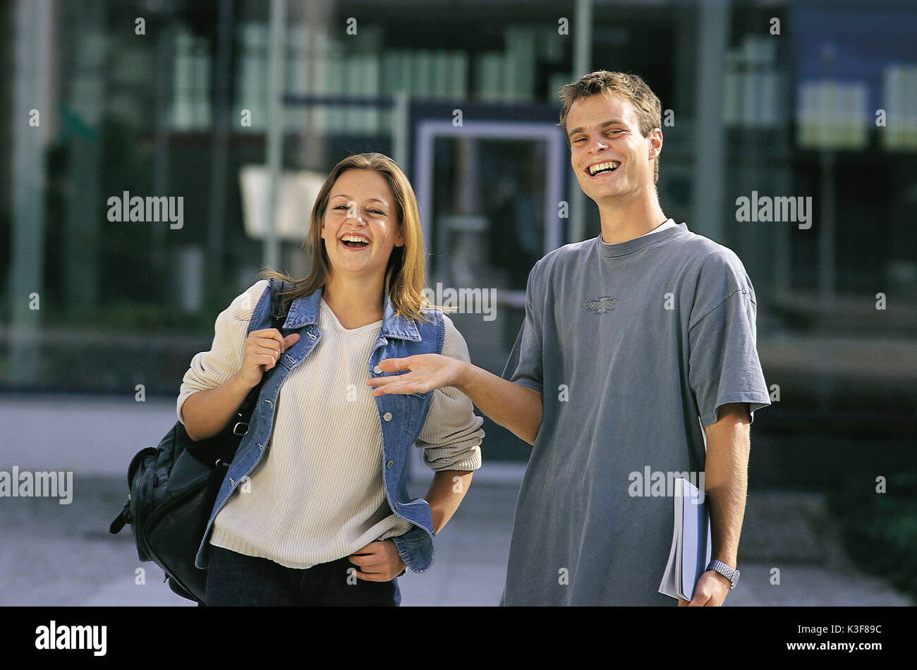Woman laughing at man hi-res stock photography and images - Alamy