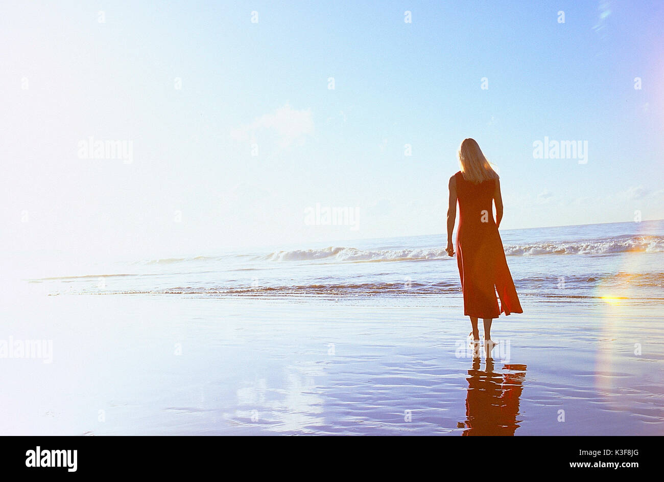 Woman alone beach hi-res stock photography and images - Alamy