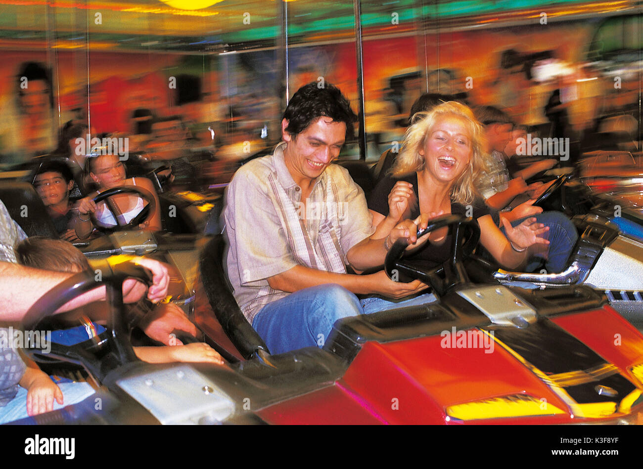Couple in the bumper car Stock Photo