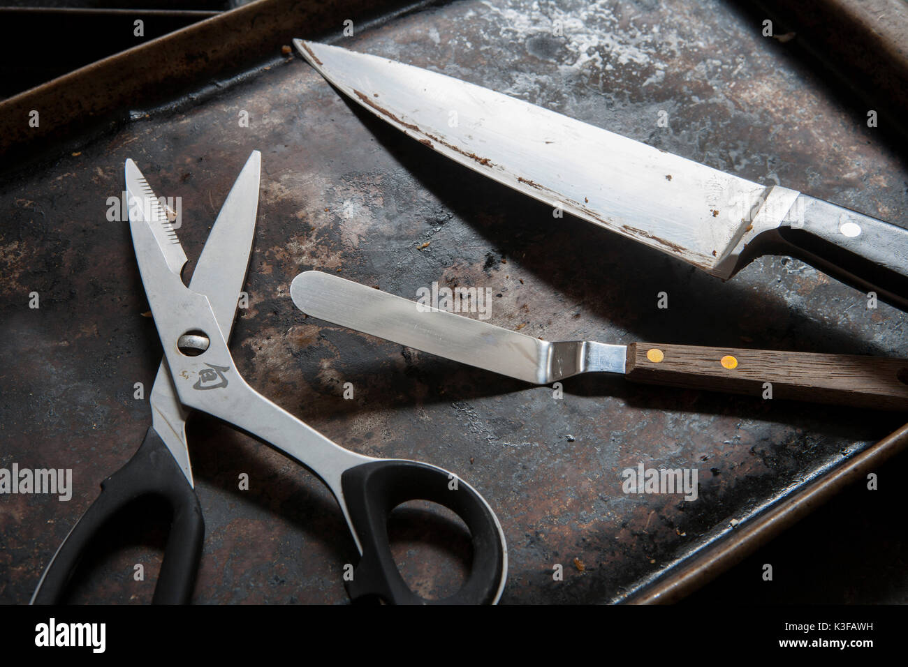 Baking Tray with Scissors, Knife and Spatula Stock Photo Alamy