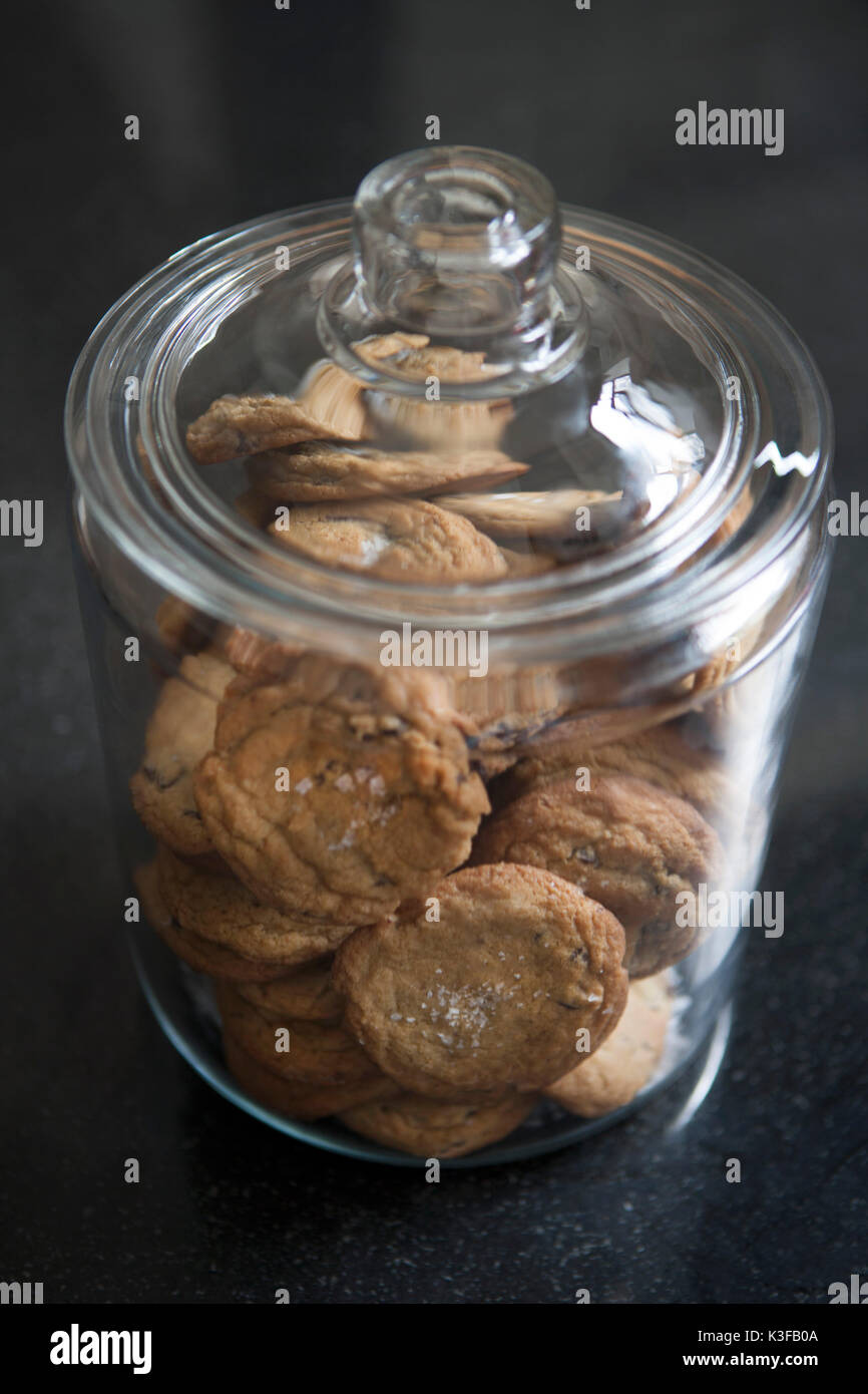 https://c8.alamy.com/comp/K3FB0A/high-angle-view-of-covered-cookie-jar-filled-with-chocolate-chip-cookies-K3FB0A.jpg