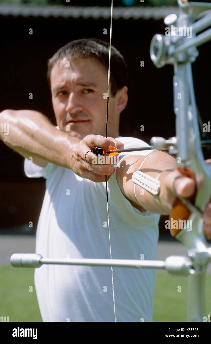 Archer spanning the Arrow Stock Photo