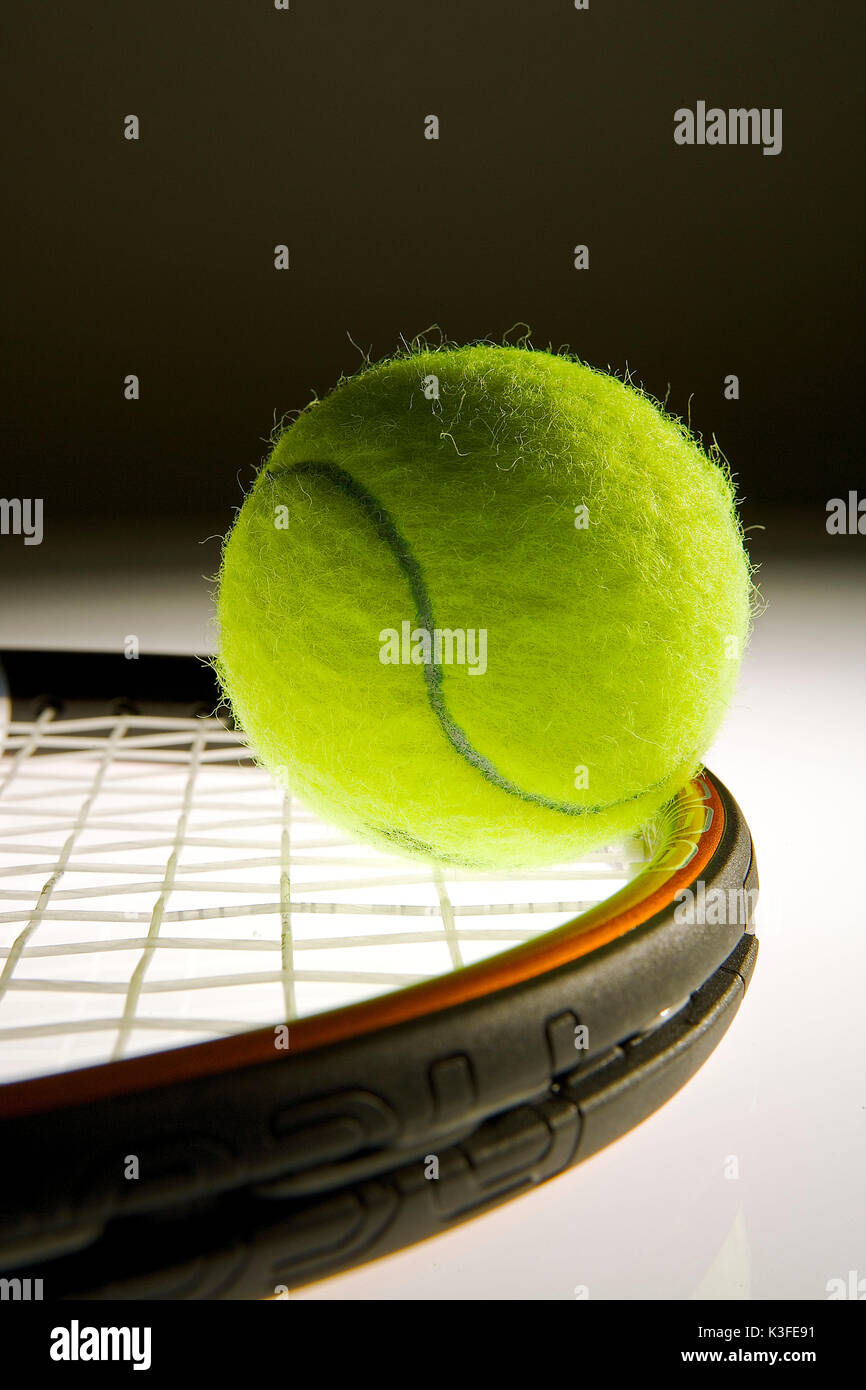 Tennis-ball and tennis racquet Stock Photo