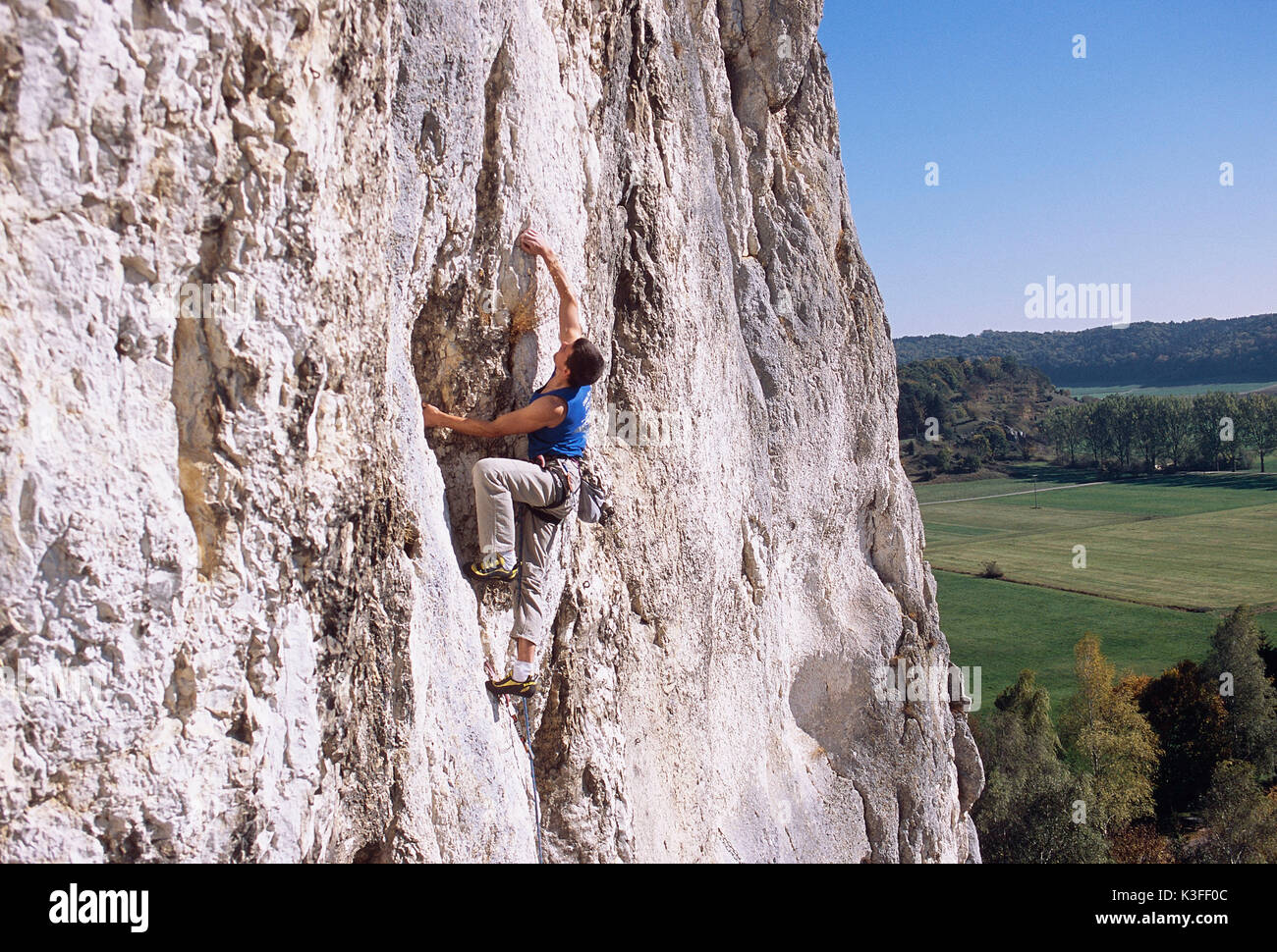 Freeclimber in cliff face at the Burgsteinfelsen, Altmuehl valley Stock Photo