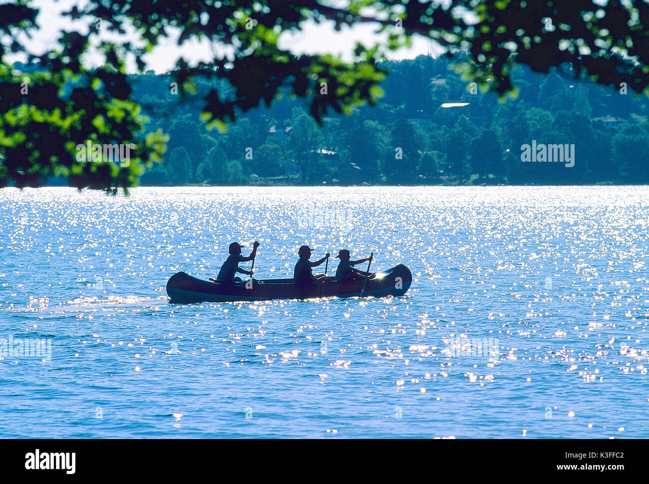 Canoe driver on Ammersee, Bavaria Stock Photo