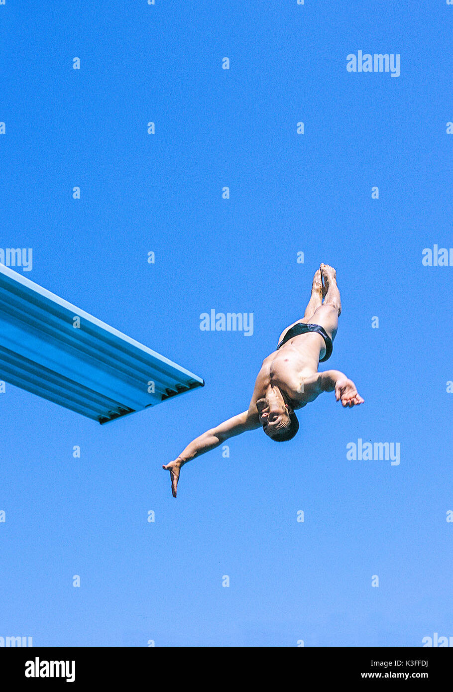 Tower jumper jumping of the springboard Stock Photo