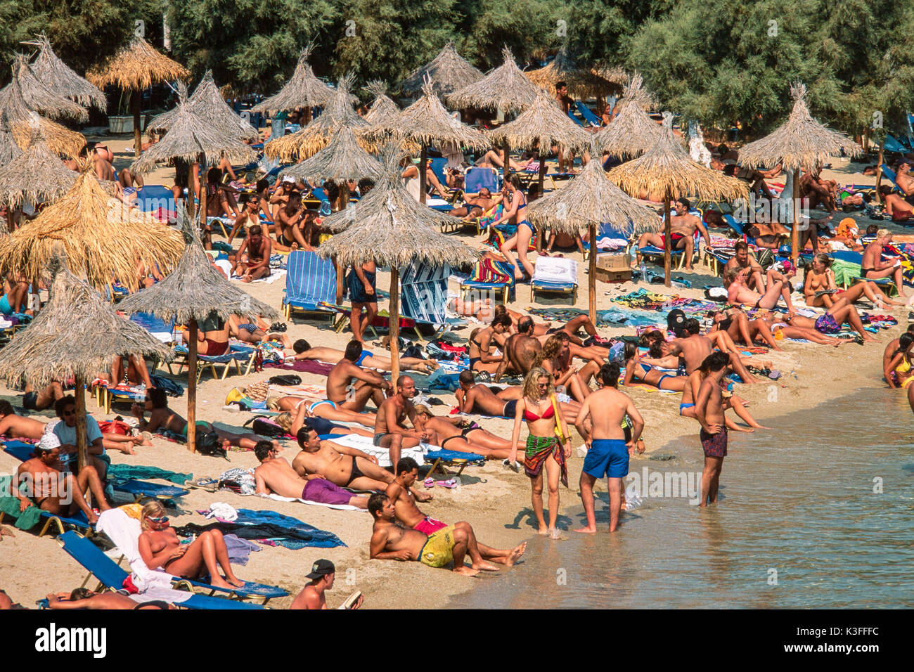 Congested holiday beach, Mykonos, Greece Stock Photo