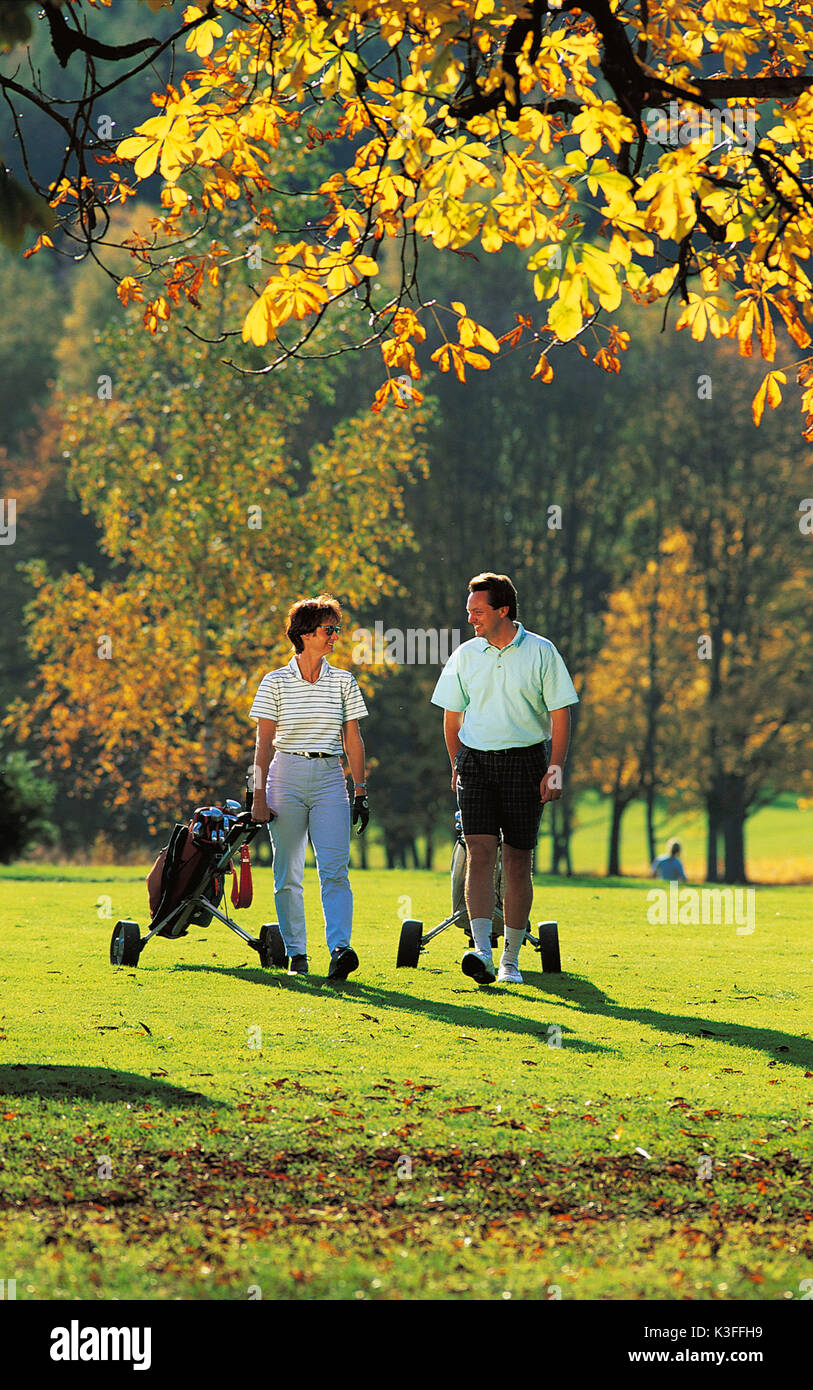 Couple close Golf carriage on the golf course, golf club of Burgwalden Stock Photo