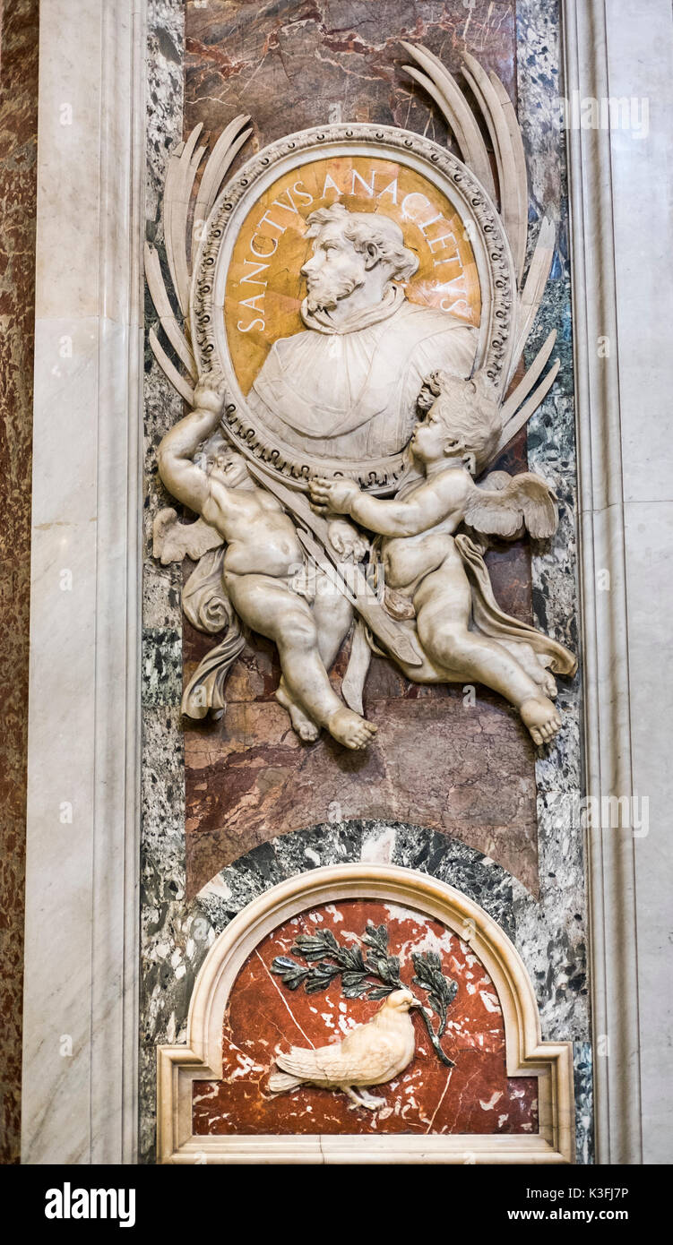 medallion showing saint anacletus suspended by angels,  st. peter´s basilica Stock Photo