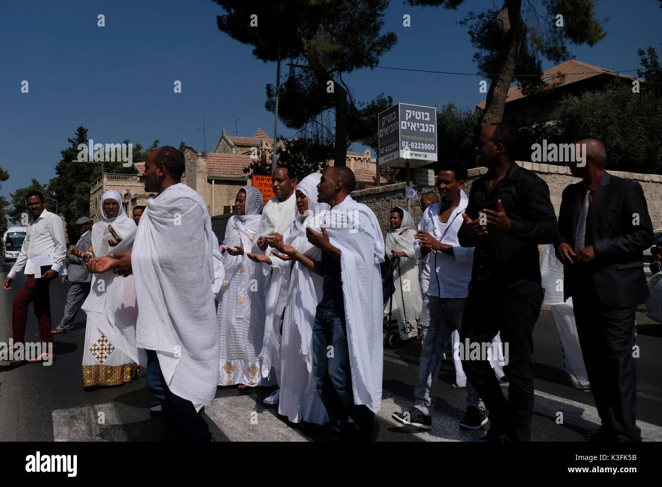 Members of the Erithrean community  crossing the Prophets or Haneviim street in West Jerusalem Israel Stock Photo