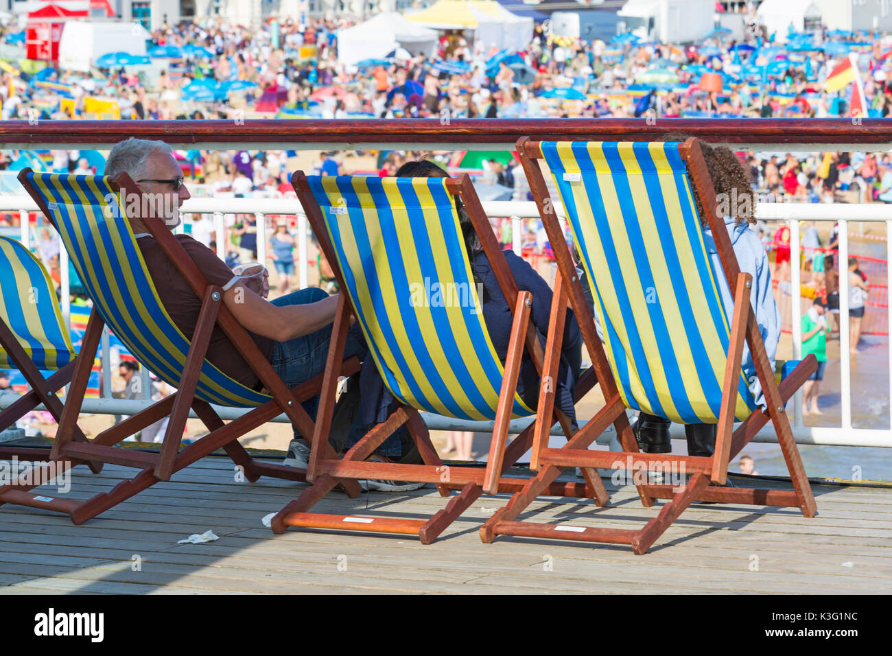 Bournemouth, Dorset, UK. 2nd Sept, 2017. UK weather: lovely warm sunny day at Bournemouth beach. Relaxing in deckchairs on Bournemouth breach with crowded beach. Credit: Carolyn Jenkins/Alamy Live News Stock Photo