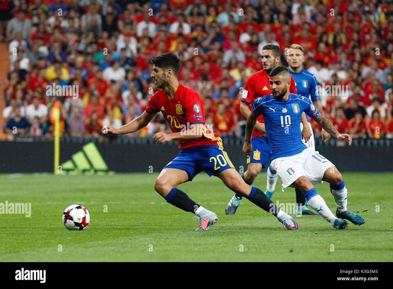 Marco Asensio (20) Spanish player. Lorenzo Insigne (10) Italian player. In  action during the qualifying match for the 2018 World Cup, Round 7, between  Spain vs Italy at the Santiago Bernabeu stadium