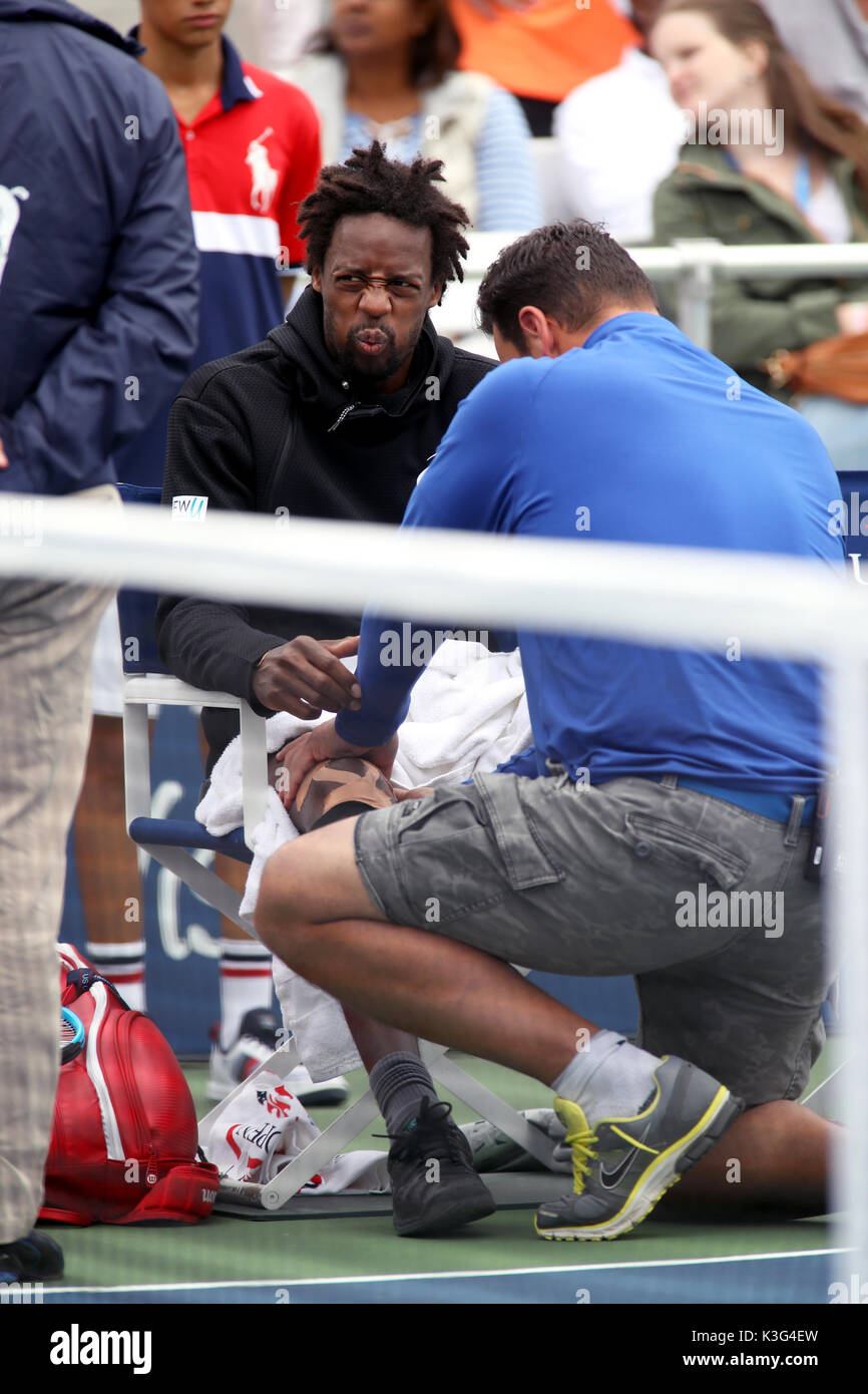 New York, USA. 2nd September, 2017. Gael Monfils of France winces as he receives treatment from the trainer during a medical timeout in his third round match against David Goffin of Belgium  at the US Open in Flushing Meadows, New York.  Monfils retired with an injury in the second set. Credit: Adam Stoltman/Alamy Live News Stock Photo