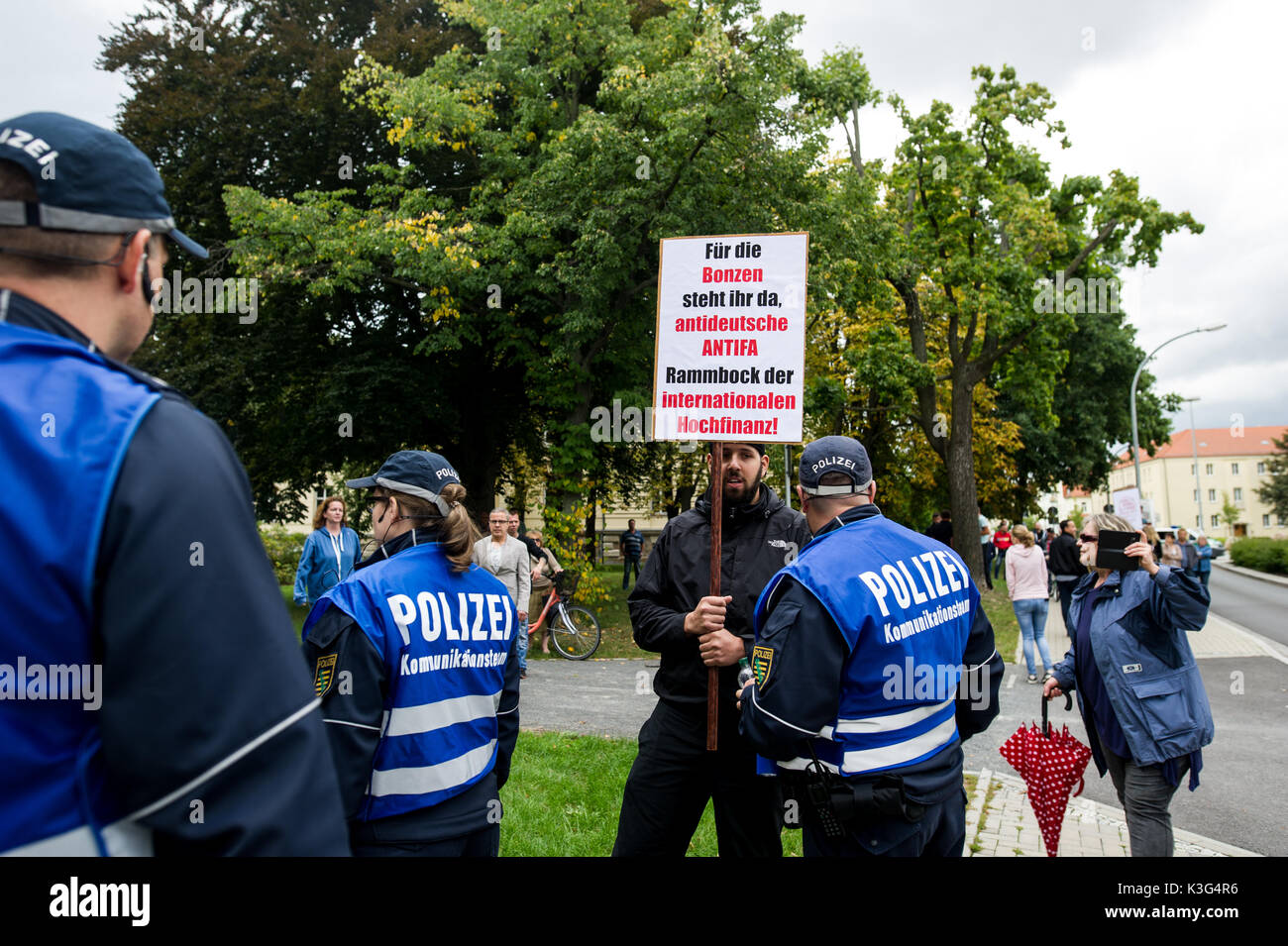 Wurzen, Germany. 02nd Sep, 2017. A Right- wing counter protester seen holding a placard. About 400 people of the Antifa-Alliance 'somewhere in Germany' demonstrated against neo-Nazi structures in the region during the 'day of saxony'. Credit: SOPA Images Limited/Alamy Live News Stock Photo