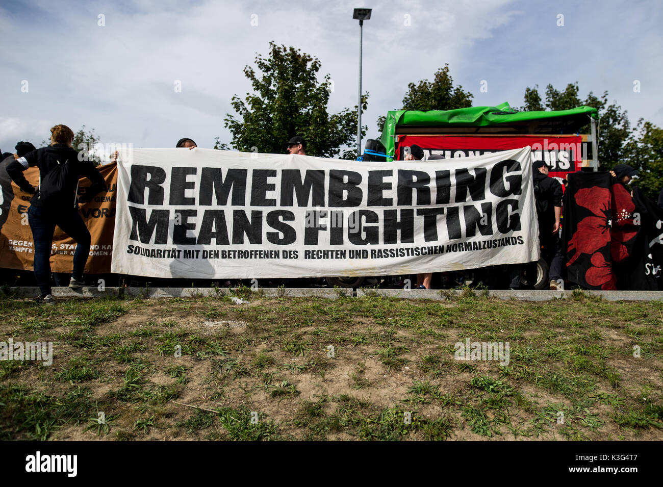 Wurzen, Germany. 02nd Sep, 2017. 'Remembering means fighting' is written on a banner.  About 400 people of the Antifa-Alliance 'somewhere in Germany' demonstrated against neo-Nazi structures in the region during the 'day of saxony'. Credit: SOPA Images Limited/Alamy Live News Stock Photo