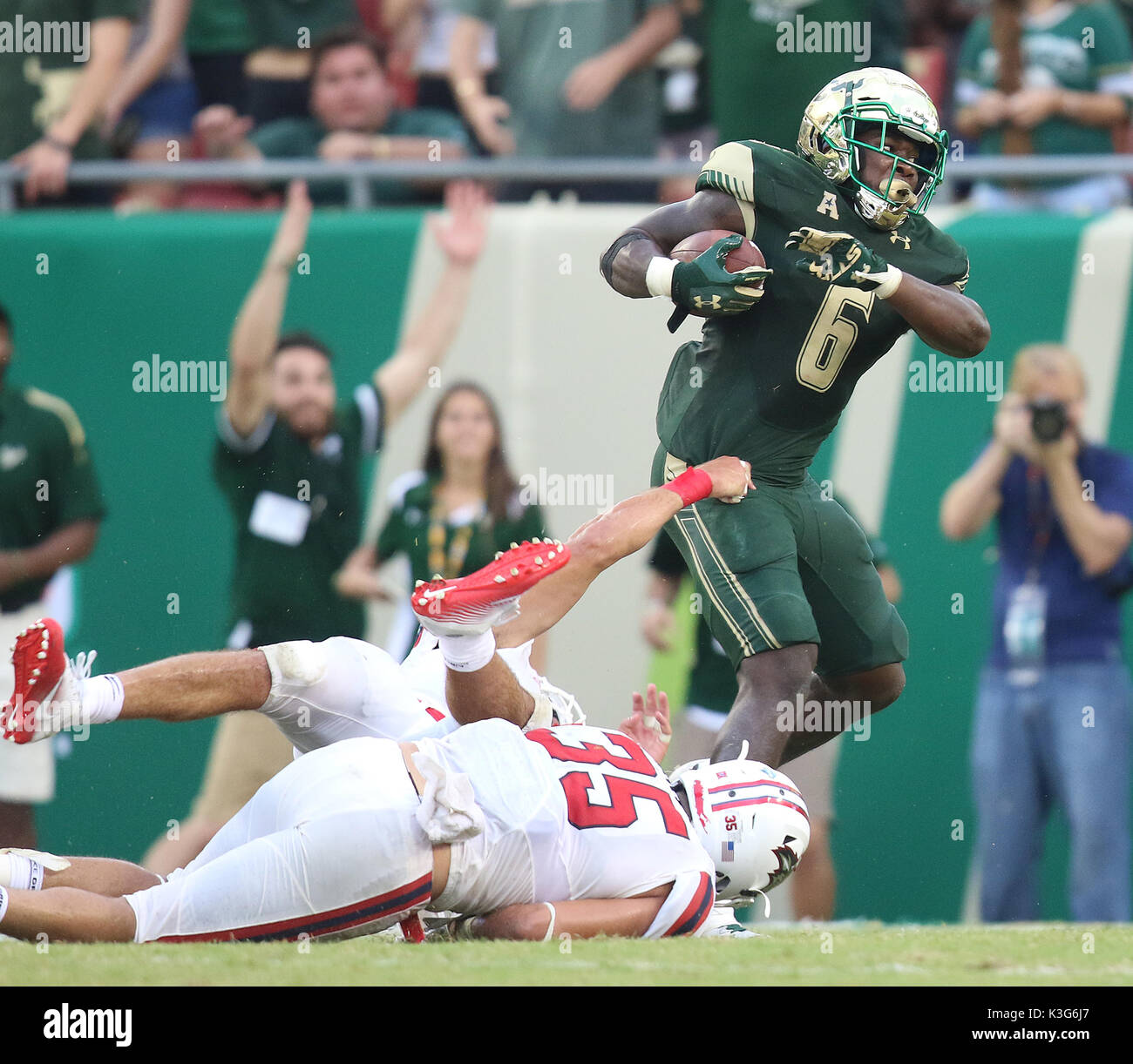 City, Florida, USA. 2nd Sep, 2017. OCTAVIO JONES | Times .South Florida running back Darius Tice (2) breaks away for a first down during the fourth quarter at Raymond James Stadium in Tampa on Saturday, September 2, 2017. The USF Bulls defeated the Stony Brook Seawolves 31 to 17. Credit: Octavio Jones/Tampa Bay Times/ZUMA Wire/Alamy Live News Stock Photo