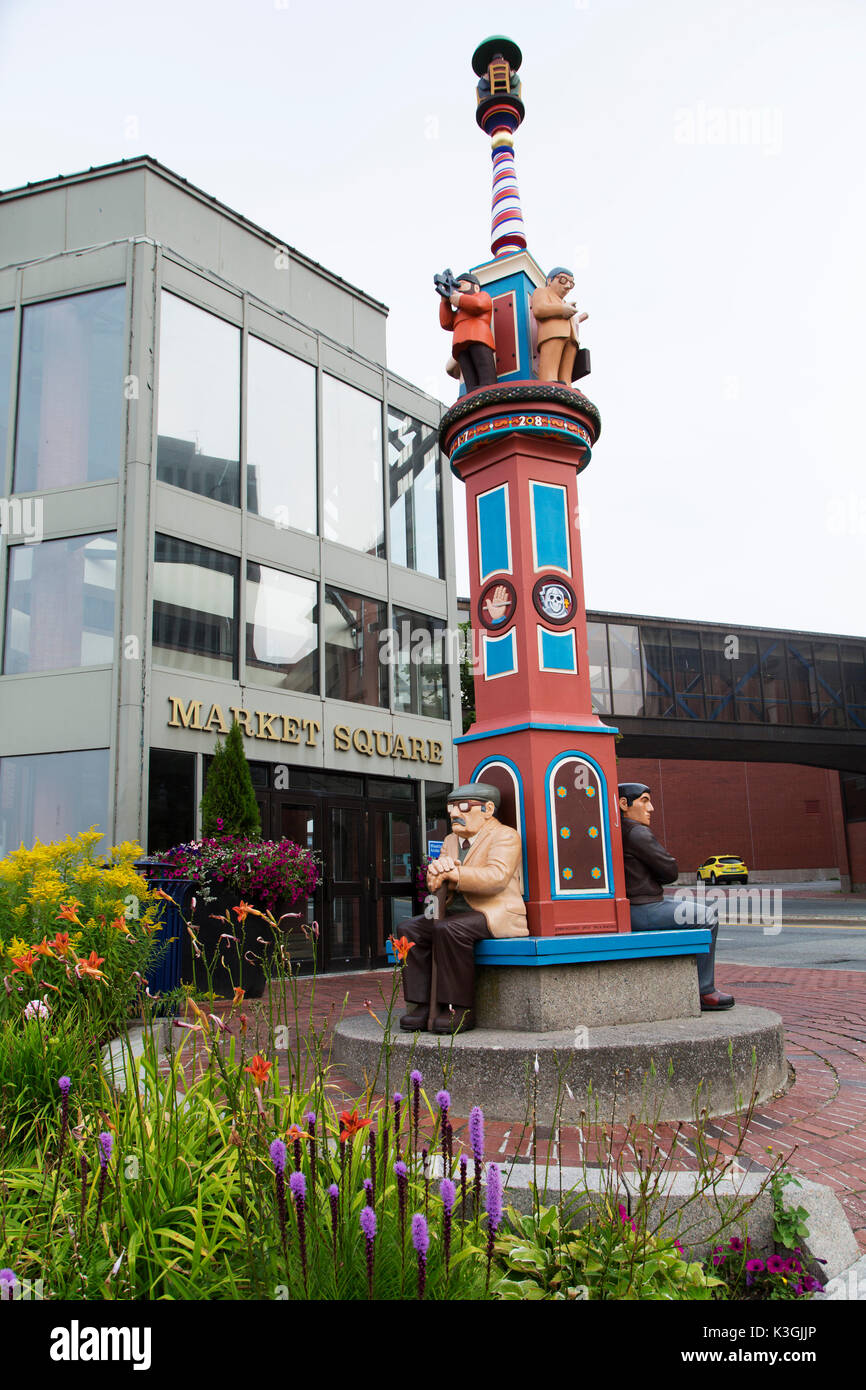 Market Square in Saint John, New Brunswick, Canada. Decorative figures adorn the seat outside of