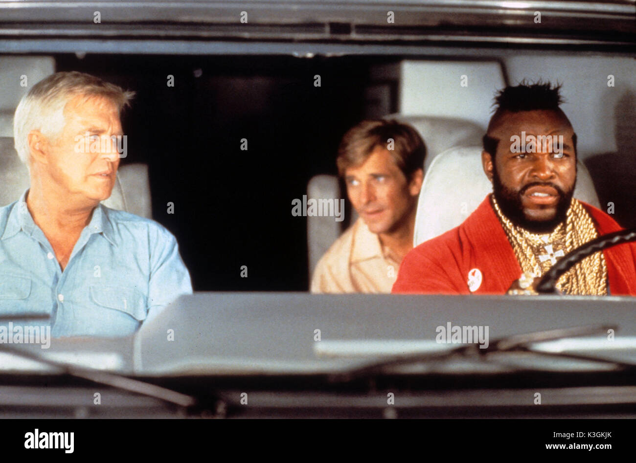 THE A-TEAM GEORGE PEPPARD as Hannibal Smith, DIRK BENEDICT as Faceman, MR T as BA Baracus Stock Photo