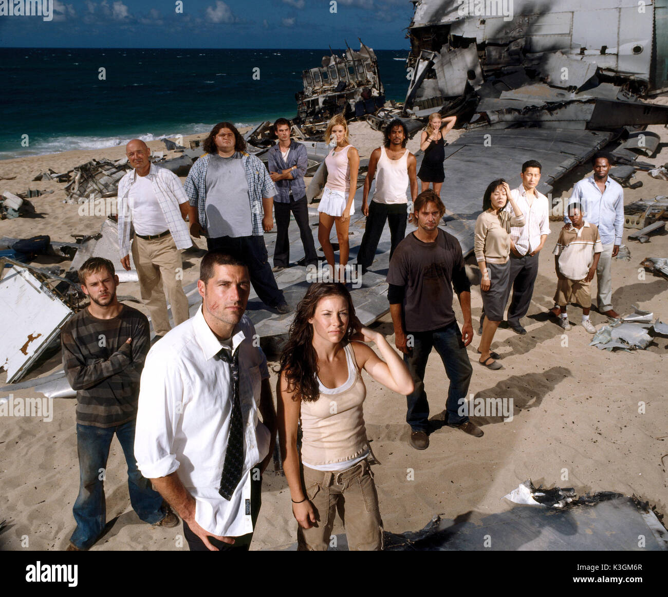 LOST [US TV SERIES 2004 - ]   Series #1   [background L-R]   TERRY O'QUINN as Locke,  JORGE GARCIA as Hurley,  IAN SOMERHALDER as Boone [2004-2005],  MAGGIE GRACE as Shannon [2004 -2005],  NAVEEN ANDREWS as Sayid,  EMILIE DE RAVIN as Claire  [foreground L-R]   DOMINIC MONAGHAN as Charlie,  MATTHEW FOX as Jack,  EVANGELINE LILLY as Kate,  JOSH HOLLOWAY as Sawyer,  DANIEL DAE KIM as Jin,  YUNJIN KIM [aka YOON-JIN KIM]  as Sun,  MALCOLM DAVID KELLEY as Walt,  HAROLD PERRINEAU as Michael Stock Photo