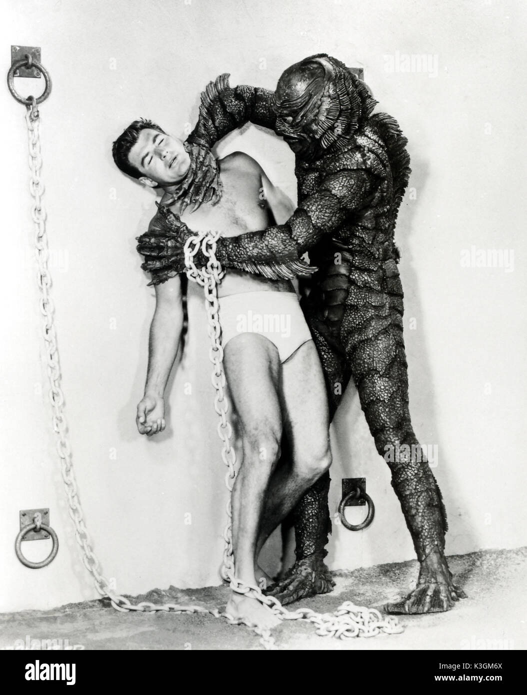 REVENGE OF THE CREATURE JOHN BROMFIELD is attacked by the Creature, TOM HENNESY is in the gill-man suit. REVENGE OF THE CREATURE     Date: 1955 Stock Photo