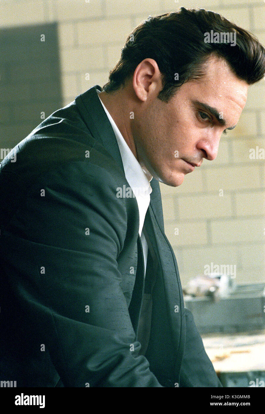 WTL-87 Joaquin Phoenix as the young Johnny Cash, an artist whose music transcended musical boundaries to touch people around the globe, in WALK THE LINE. Photo credit: Suzanne Tenner TM and  2005 Twentieth Century Fox. All Rights Reserved. Not for sale or duplication. WALK THE LINE JOAQUIN PHOENIX as Johnny Cash WTL-87 Joaquin Phoenix as the young Johnny Cash, an artist whose music transcended musical boundaries to touch people around the globe, in WALK THE LINE. Photo credit: Suzanne Tenner TM and  2005 Twentieth Century Fox. All Rights Reserved. Not for sale or duplication.     Date: 2 Stock Photo