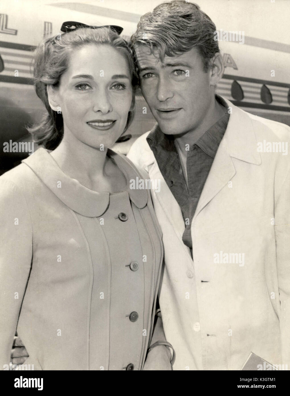 SIAN PHILLIPS and PETER O'TOOLE   [ 'Actor Peter O'Toole and his wife Sian leave London Airport for a few days holiday in Rome. I feel like having a change from England  said Peter who is currently working on the film 'LORD JIM'.  May 17, 1964]    [The couple were married from 1959 - 1979] Stock Photo