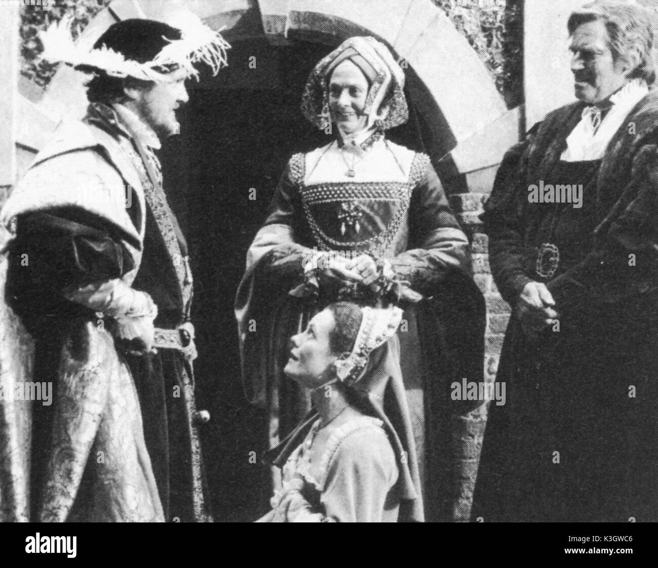 A MAN FOR ALL SEASONS MARK CHAMBERLAIN, ADRIENNE THOMAS, VANESSA REDGRAVE , CHARLTON HESTON as Sir Thomas More on location at Dourney Court A MAN FOR ALL SEASONS from left - MARK CHAMBERLAIN, ADRIENNE THOMAS, VANESSA REDGRAVE [behind], and CHARLTON HESTON as Sir Thomas More, on location at Dourney Court Made at Pinewood with US money [Turner Network Television] and directed by Charlton Heston, produced by his son Fraser Heston Stock Photo